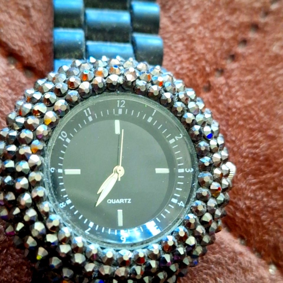 Analogue quartz wristwatch photographed for a marketplace product listing